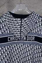 Dior knit jacket with “CHRISTIAN DIOR” text band and navy/white monogram design