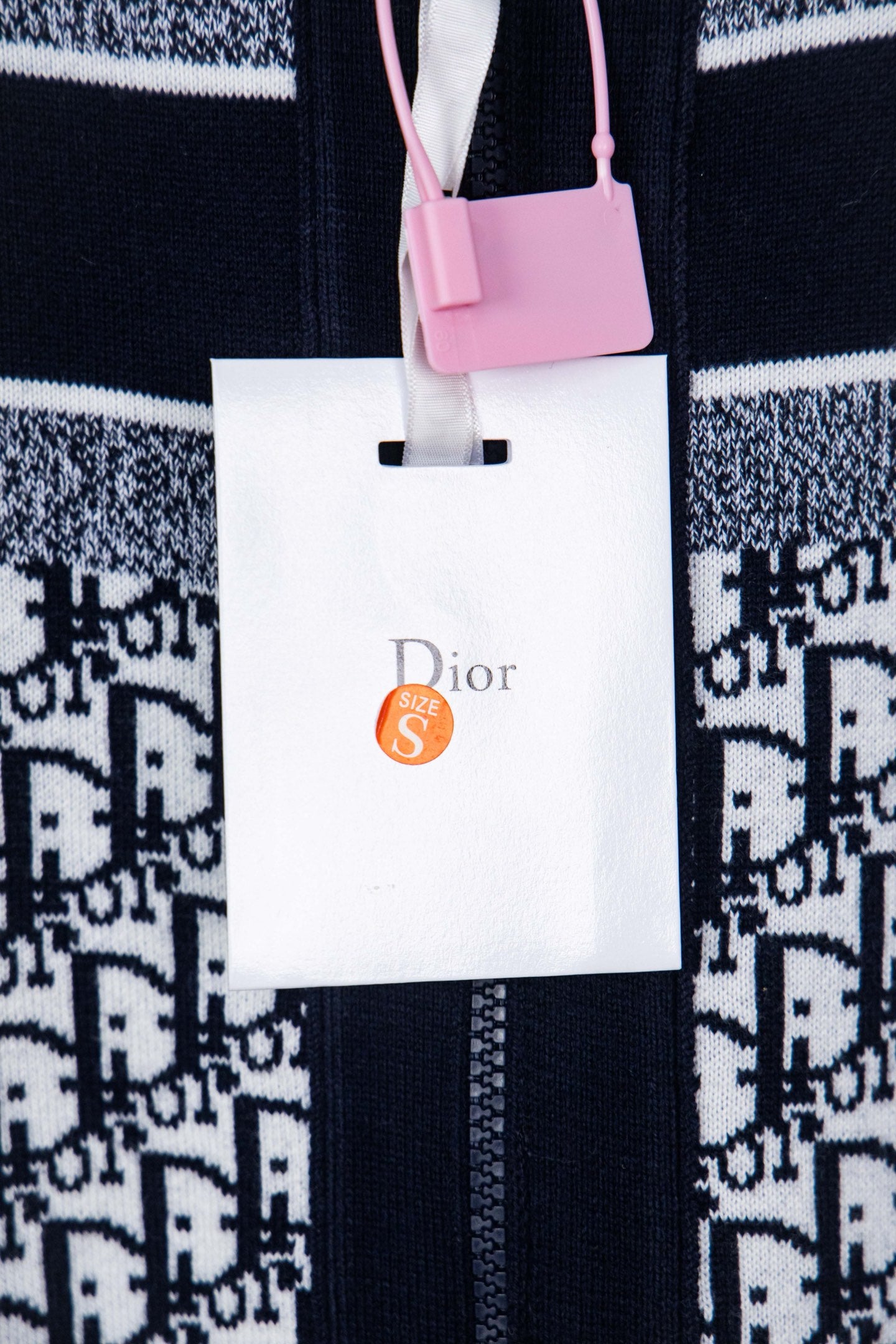 Dior knit jacket with attached white hang tag