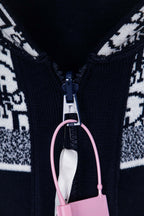 Dior knit jacket zipper close-up with pink pull charm and ribbed knit edges