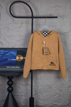 Burberry tan hooded knit jacket with full-length zipper and check lining at hood