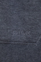 Heather gray hoodie cuff with subtle DIOR embroidery on the hem