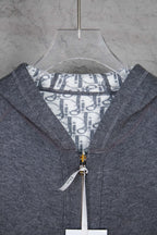 Zip hoodie neckline with patterned inner hood panel and ribbed hood edges