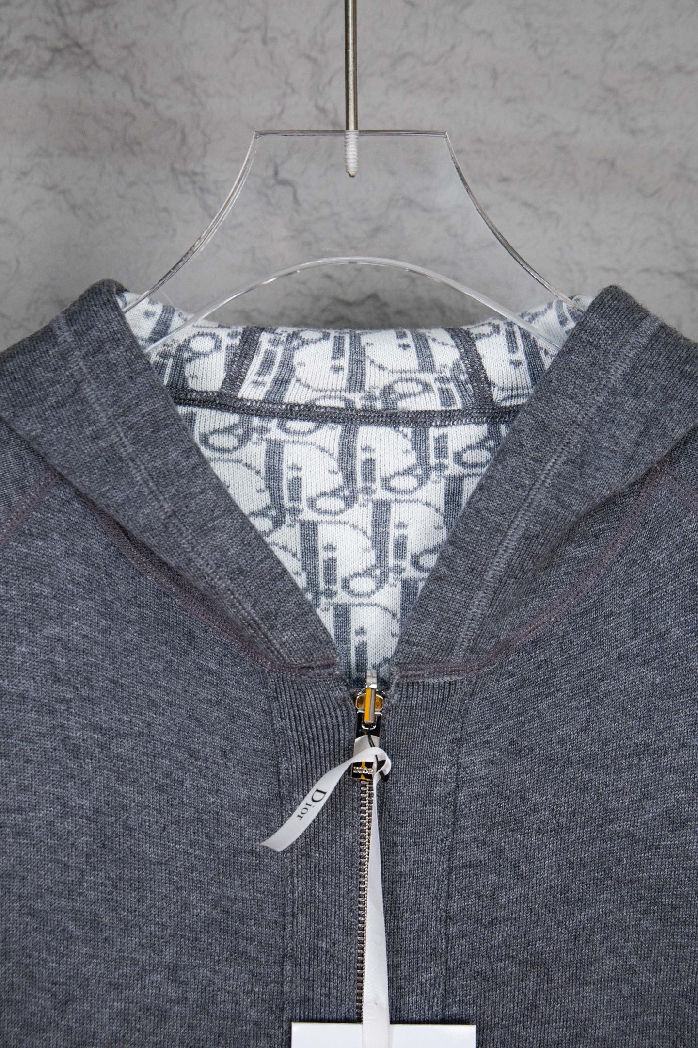 Zip hoodie neckline with patterned inner hood panel and ribbed hood edges