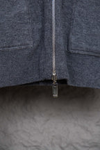 Dark blue zip-front jacket with metal zipper