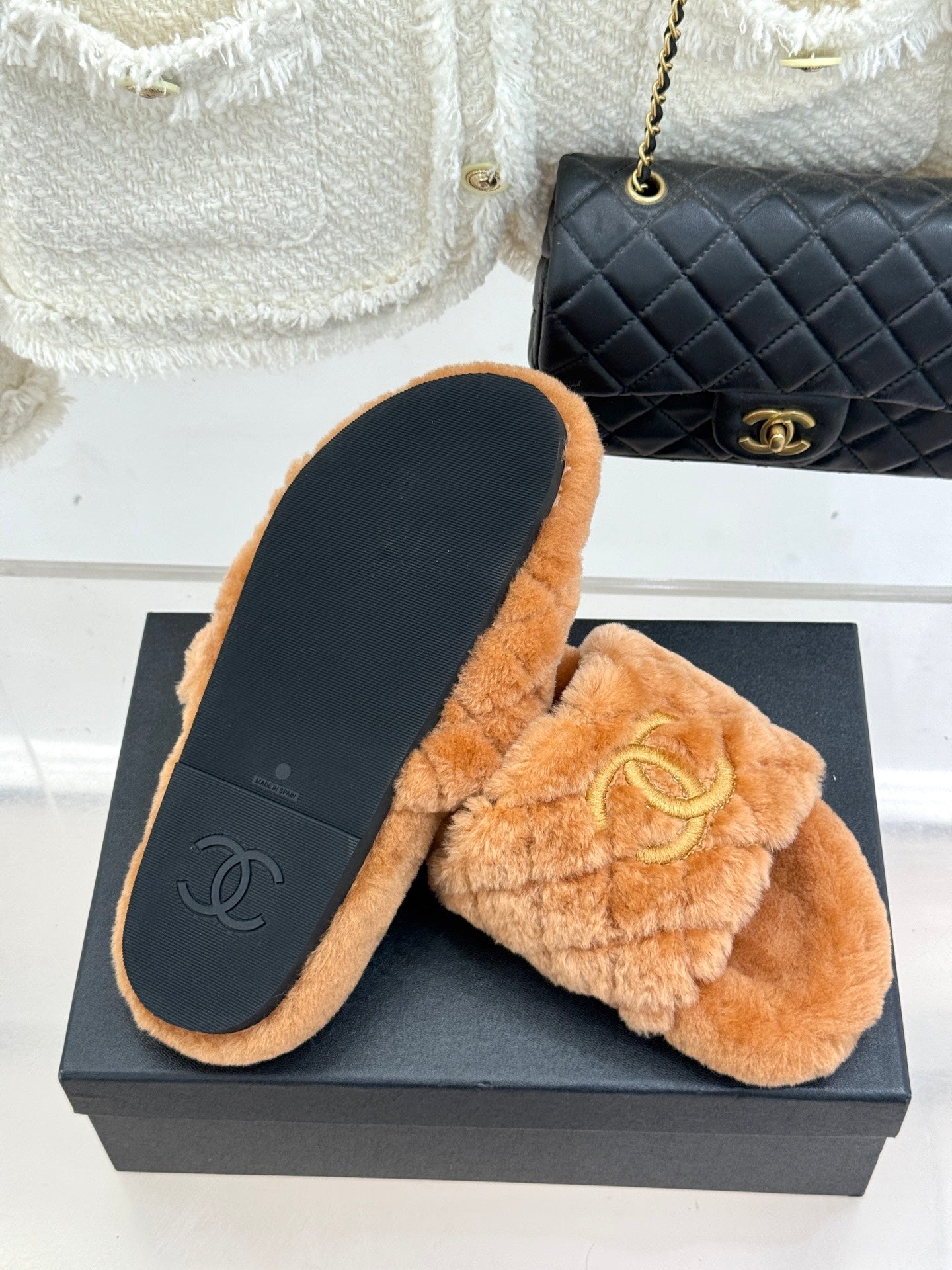 Tan Chanel fuzzy slide slippers with dark insoles, Double C logo on the top band