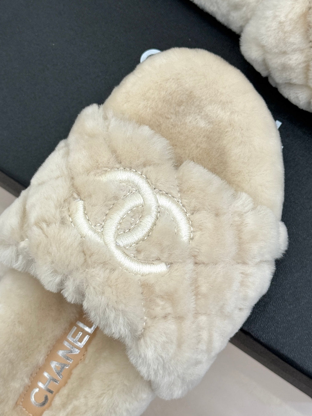 Cream plush slide sandal with bow and double-C logo detail