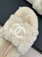 Cream plush slide sandal with bow and double-C logo detail