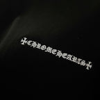 Black sweatshirt with embroidered logo text across the chest
