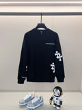 Black crewneck sweatshirt with white cross applique and small chest logo