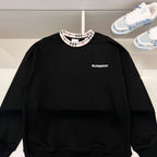 Black crewneck sweatshirt with Nova Check ribbed collar and small Burberry logo on chest