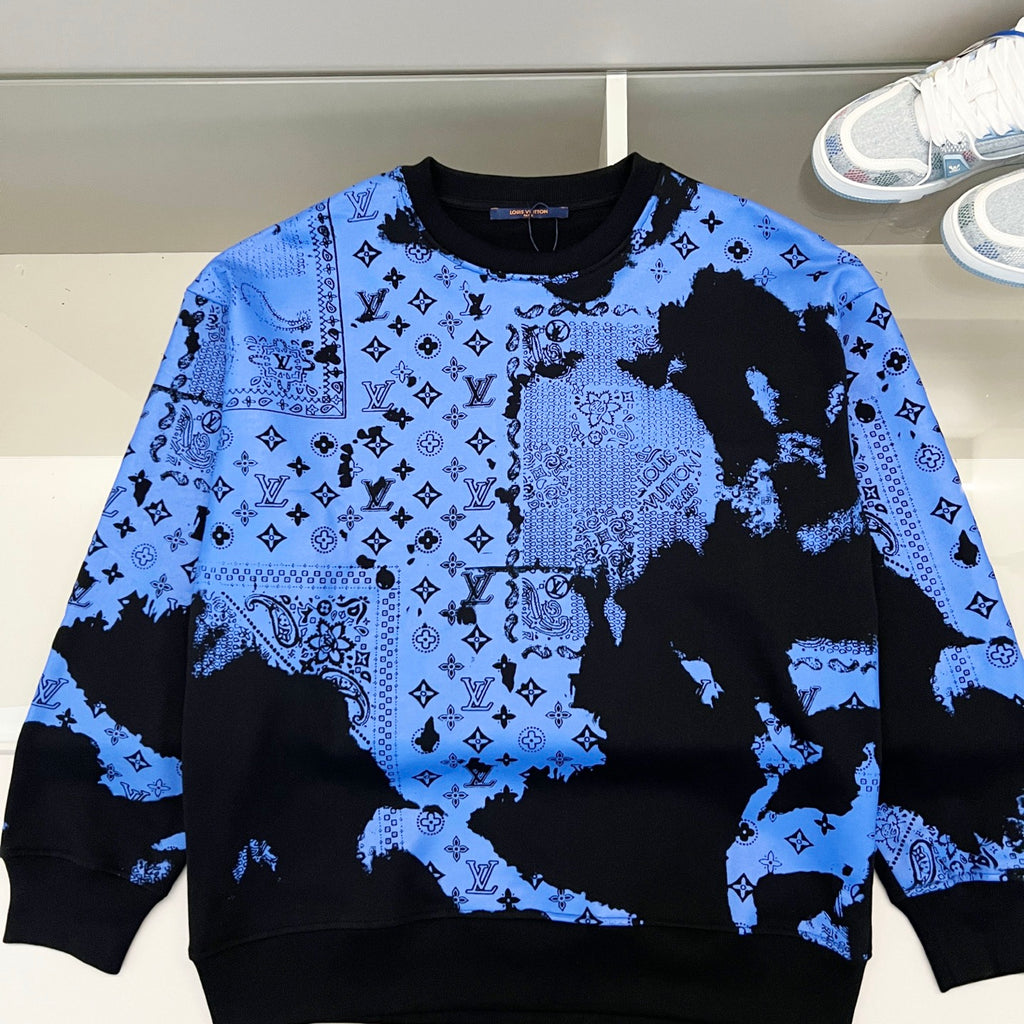 Long-sleeve crew sweatshirt in bright blue with black abstract icon pattern