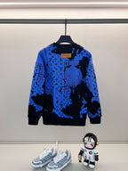 Long-sleeve sweatshirt with blue-and-black abstract monogram-style print and crew neck