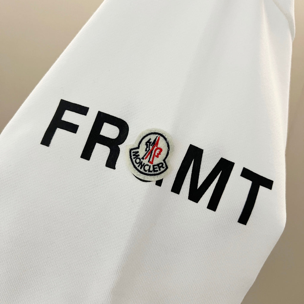 Moncler white sleeve detail with FR Moncler logo patch graphic