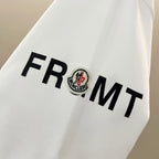 Moncler white sleeve detail with FR Moncler logo patch graphic