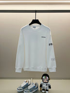 Moncler white long-sleeve sweatshirt with small chest logo and crew neck