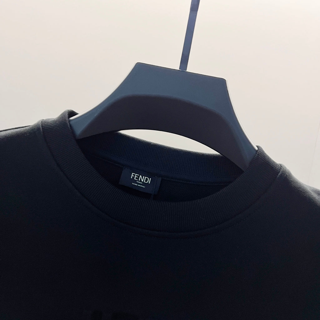 Black crewneck sweatshirt neckline with Fendi label inside neck