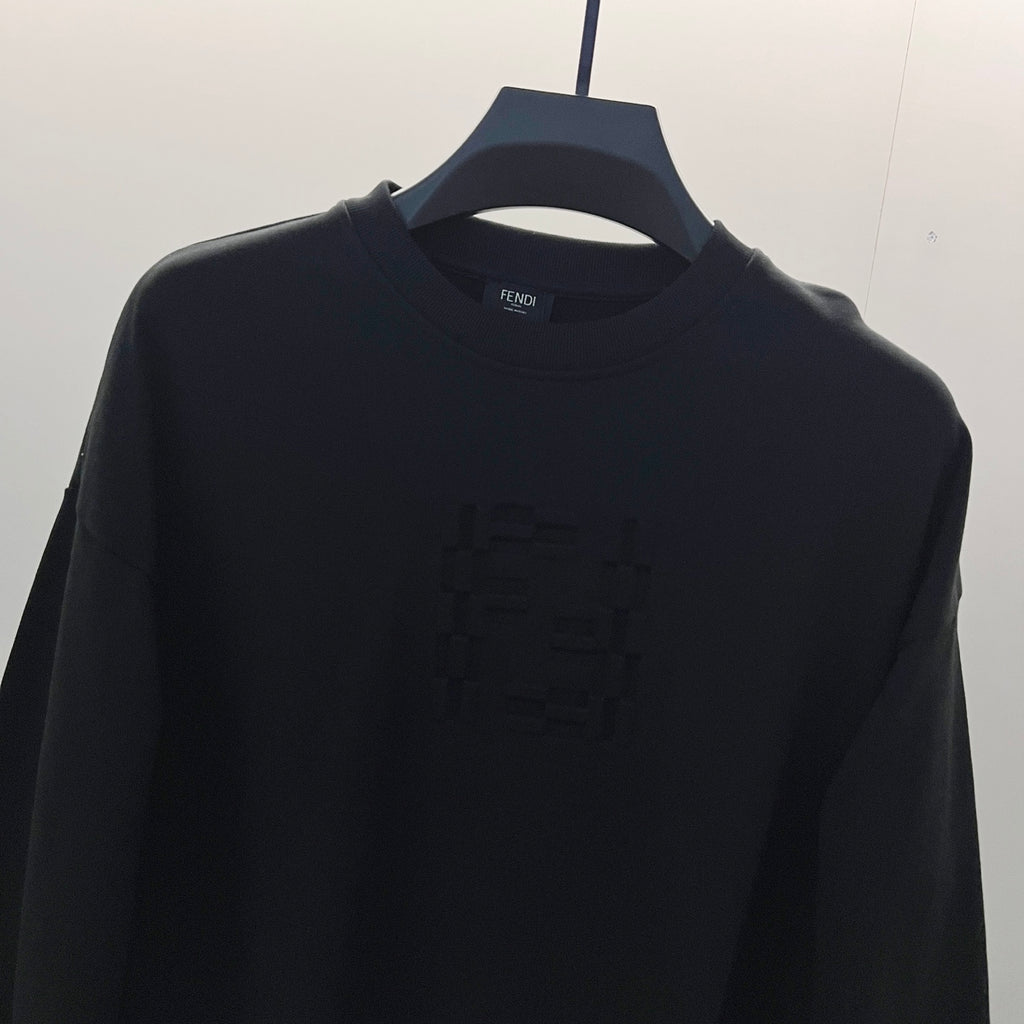 Black crewneck sweatshirt with embossed Fendi logo at chest