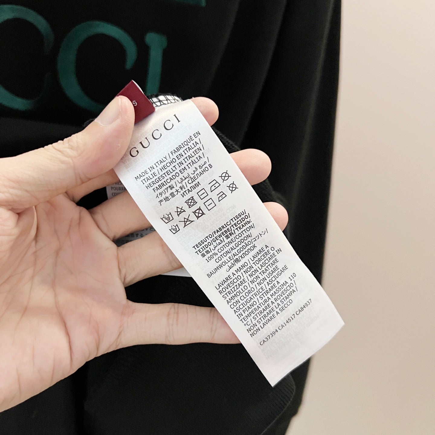 Gucci sweatshirt care label on inner neck area
