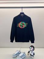 Dark navy sweatshirt with multicolor GUCCI logo on chest, crew neck.