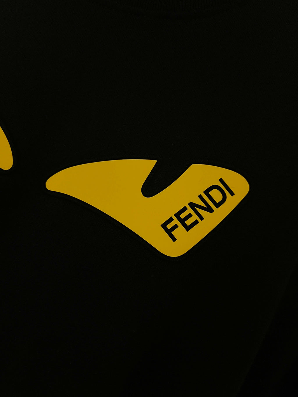 Black Fendi sweatshirt with yellow Fendi graphic logo print