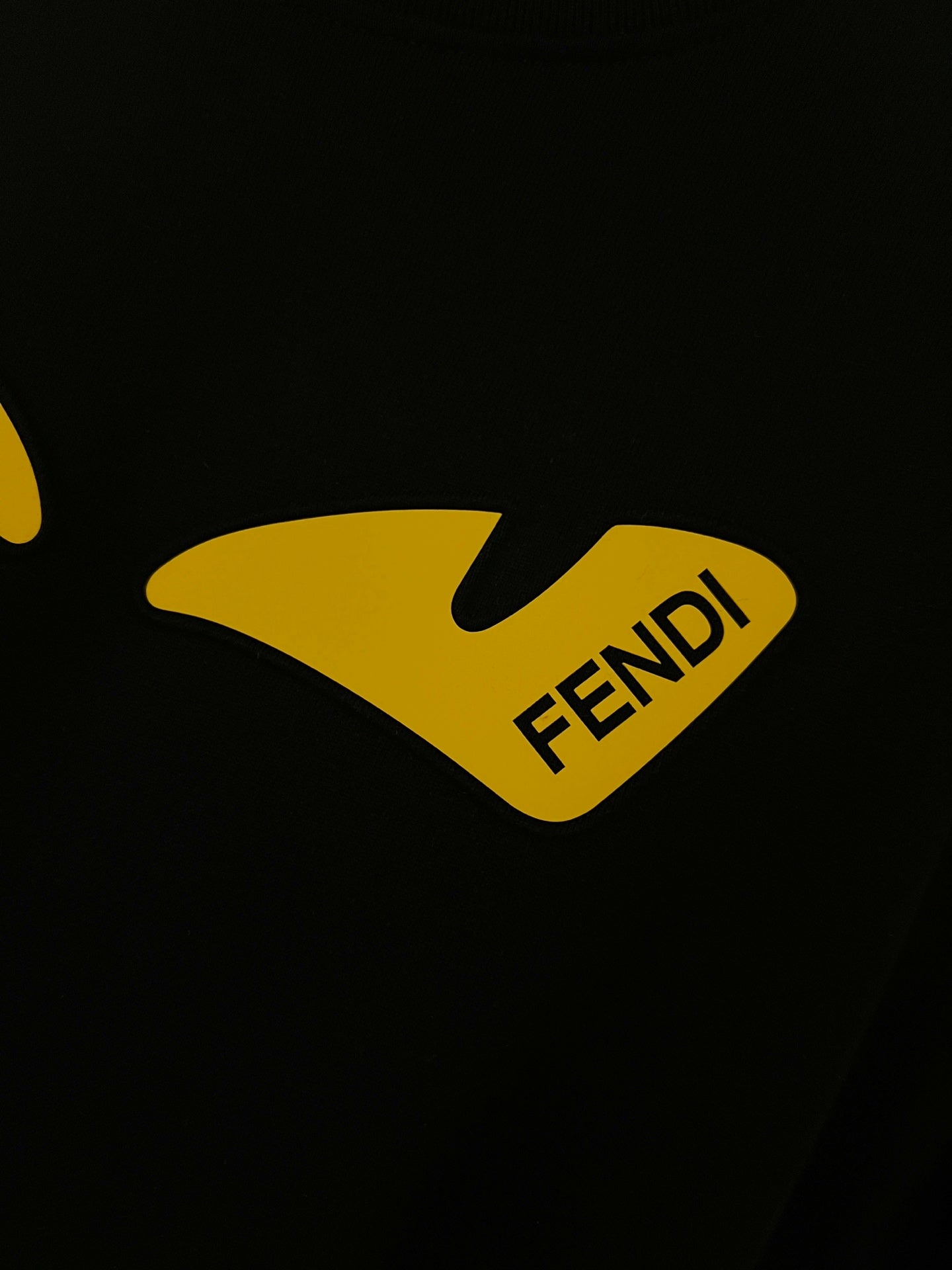 Black Fendi sweatshirt with yellow Fendi graphic logo print