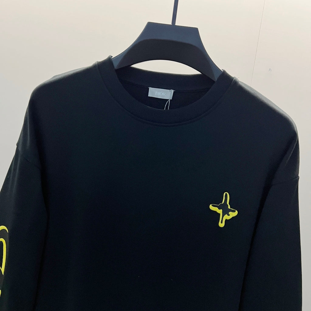 Black long-sleeve shirt with neon yellow cross chest embroidery