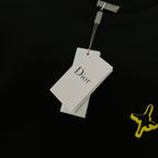 Black long-sleeve shirt with hanging white brand tag