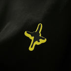 Black fabric with neon yellow star-like cross embroidery
