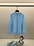 Light blue hoodie with allover logo pattern, front kangaroo pocket, and drawstring hood