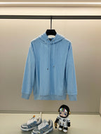 Light blue hoodie with allover logo pattern, front kangaroo pocket, and drawstring hood