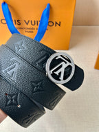 Louis Vuitton dark leather belt end with eyelets and silver logo buckle on monogram strap
