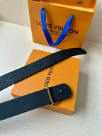 Louis Vuitton dark leather belt with monogram emboss and adjustable metal buckle clasp