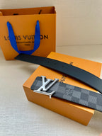 Dark gray check belt with silver LV buckle and dark leather belt strap