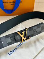 Louis Vuitton Damier belt close-up with gold LV buckle on dark strap