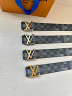 Louis Vuitton Damier belt with gold LV buckle, multiple straps on table