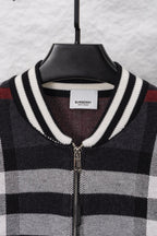 Plaid zip cardigan neckline with ribbed striped trim and front zipper, dark with white/red