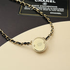 Gold chain necklace with round backplate charm pendant and linked chain