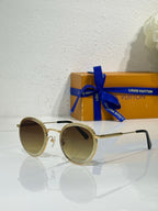 Louis Vuitton round sunglasses, gold-tone frame, green-tinted lenses
