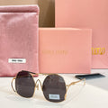MiuMiu gold-tone sunglasses with dark purple tinted round lenses