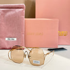 MiuMiu gold-tone sunglasses with light amber tinted round lenses