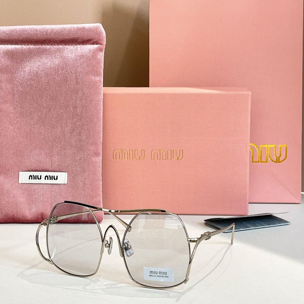 MiuMiu gold-tone sunglasses with clear tinted round lenses