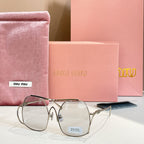 MiuMiu gold-tone sunglasses with clear tinted round lenses