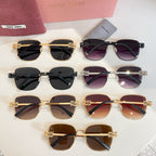 Assorted square sunglasses on display with gold, black, and purple frames.
