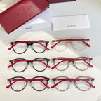 Gucci eyeglasses assortment of three pairs with red temple accents and clear lenses