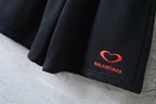 Balenciaga shorts hem with red heart logo and BALENCIAGA text embroidery