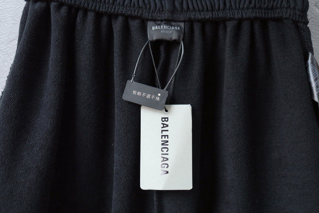 Balenciaga shorts front view with hang tags on the waistband
