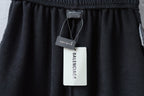Balenciaga shorts front view with hang tags on the waistband