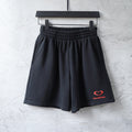 Balenciaga shorts in dark navy with elastic waistband and red heart logo patch