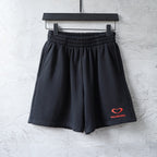 Balenciaga shorts in dark navy with elastic waistband and red heart logo patch