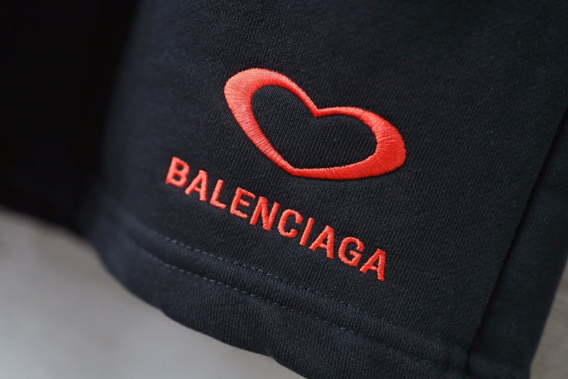 Balenciaga red heart and BALENCIAGA logo on dark navy shorts
